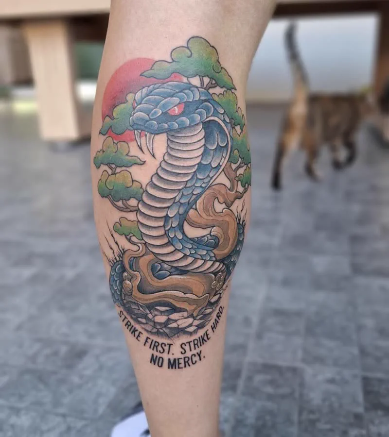 Colour cobra leg tattoo, Koh Samui