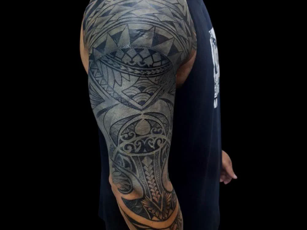 Polynesian ornamental sleeve tattoo, Koh Samui